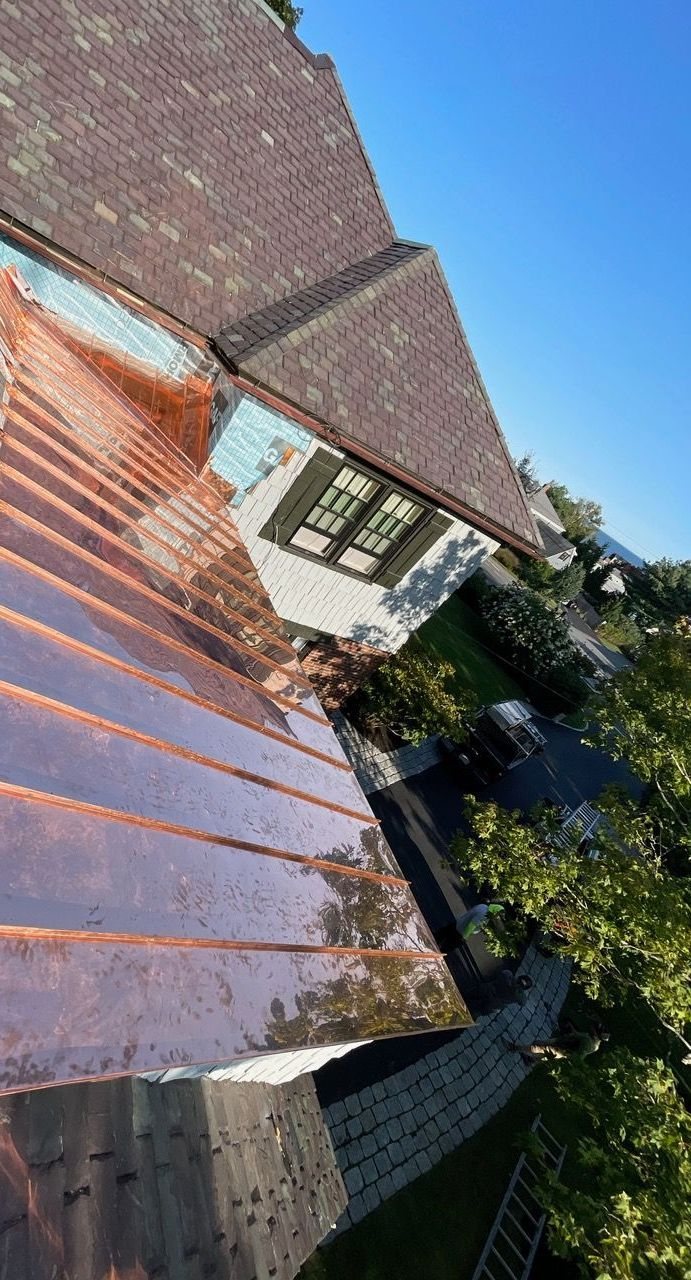Aerial view of copper roof installation