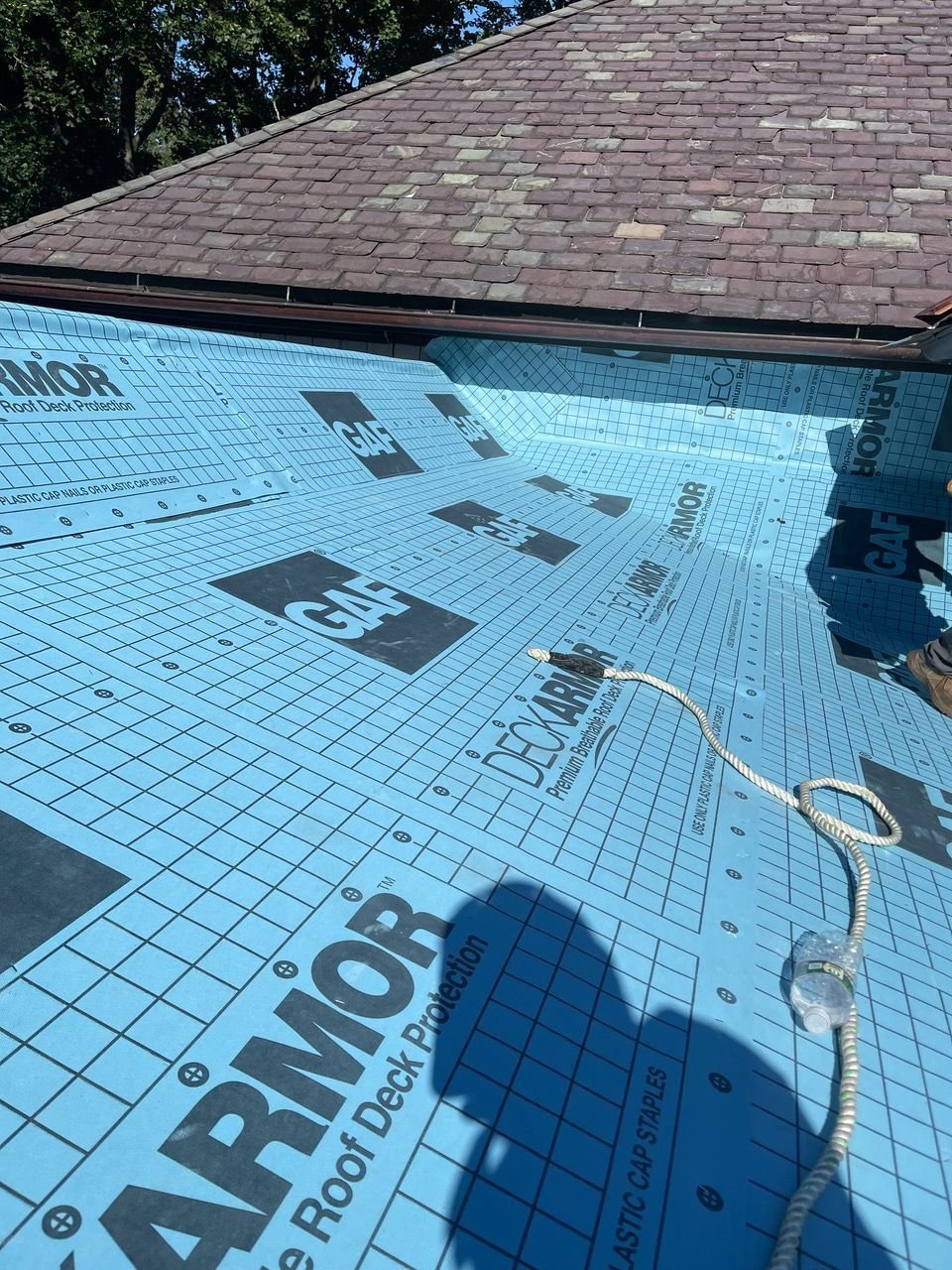 Close detail of slate repair on a Boston brick townhouse